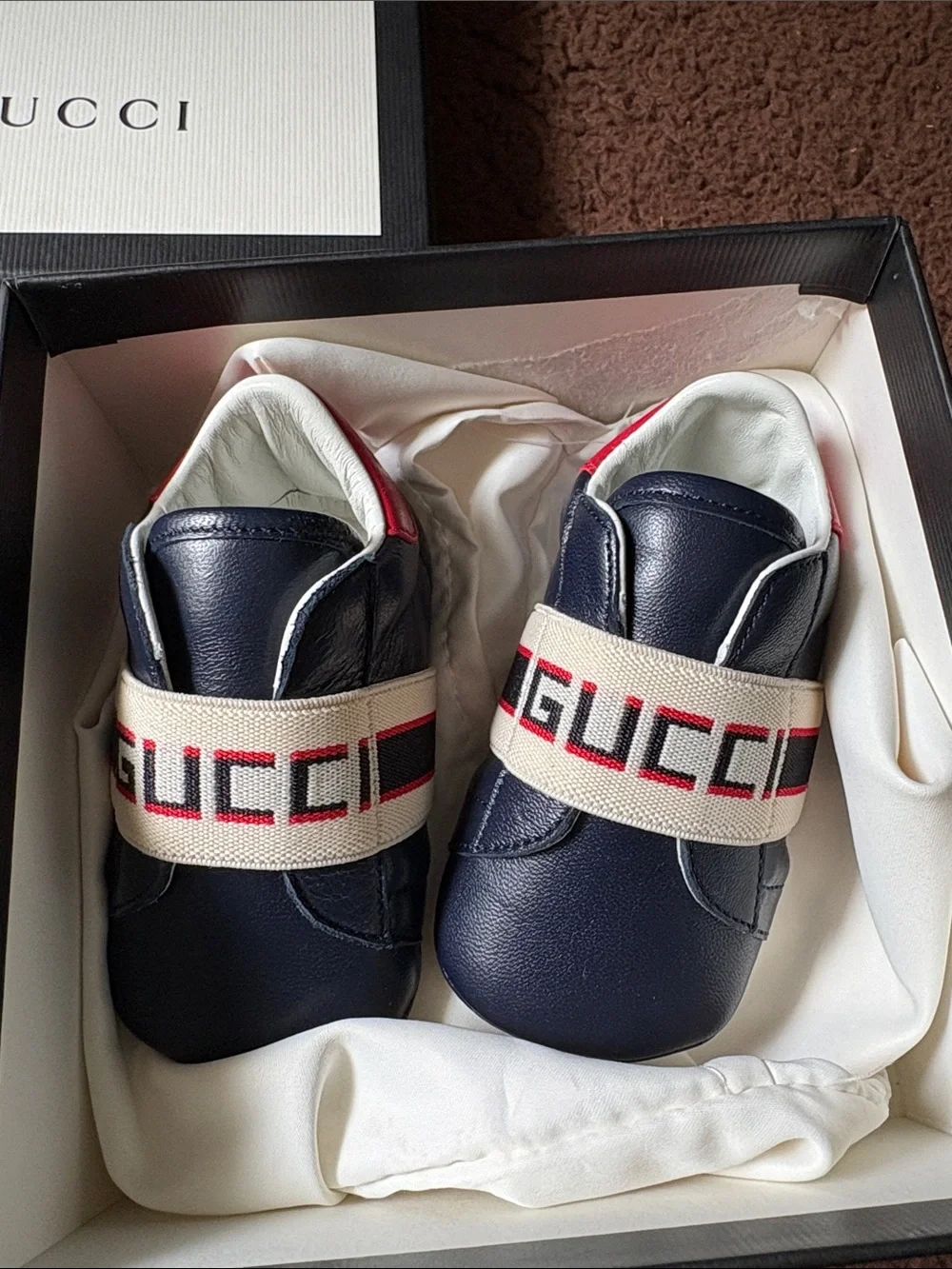 Gucci Navy Leather Baby Sneakers with Red and White Logo Strap